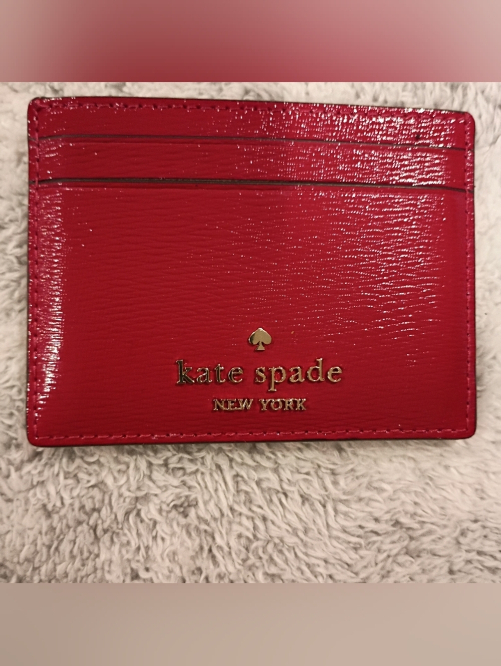 kate spade glossy red cardholder with gold logo